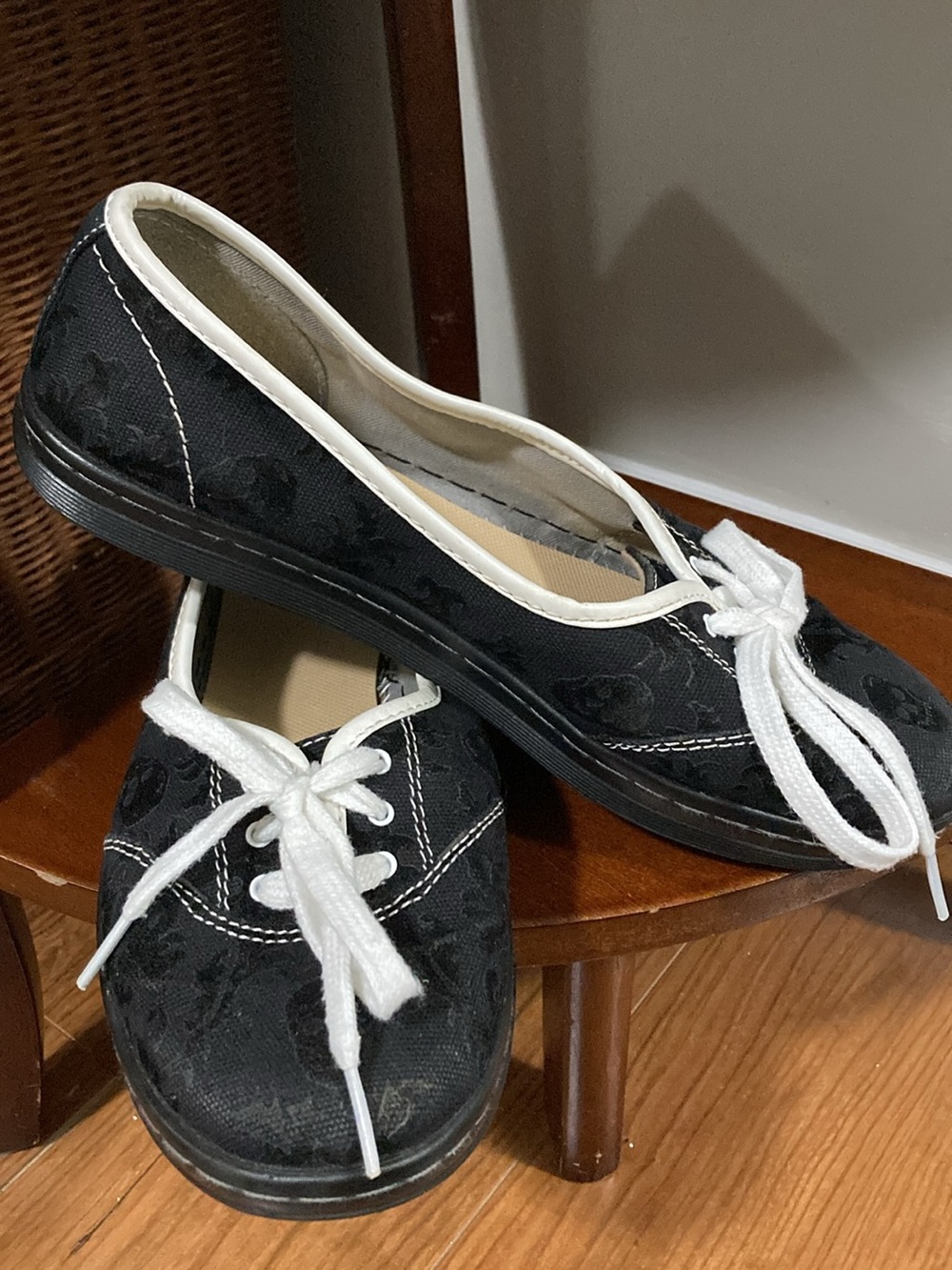 Dr. Martens Black Canvas Lace-Up Women's Flats with White Trim